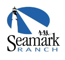 children walking towards a lighthouse above the words Seamark Ranch